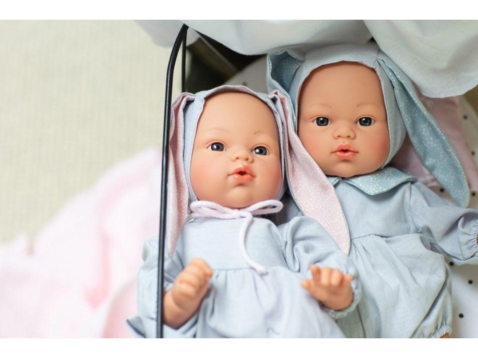 Asi Koke baby doll in gray dress with a hood with rabbit ears 36 cm