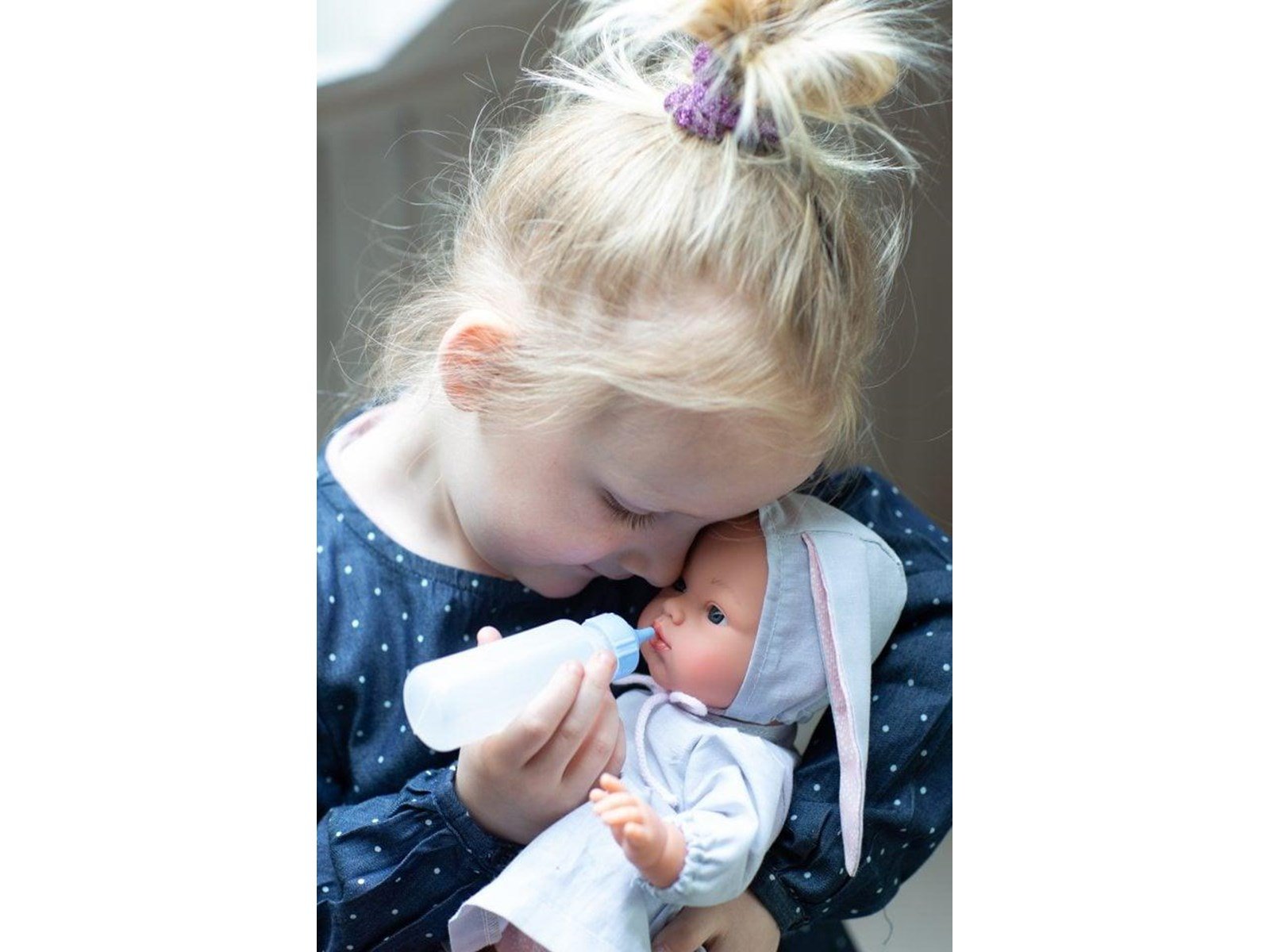 Asi Koke baby doll in gray dress with a hood with rabbit ears 36 cm