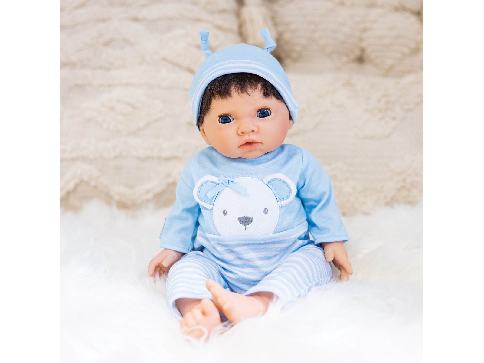 Tiny Treasures Doll with brown hair and blue outfit